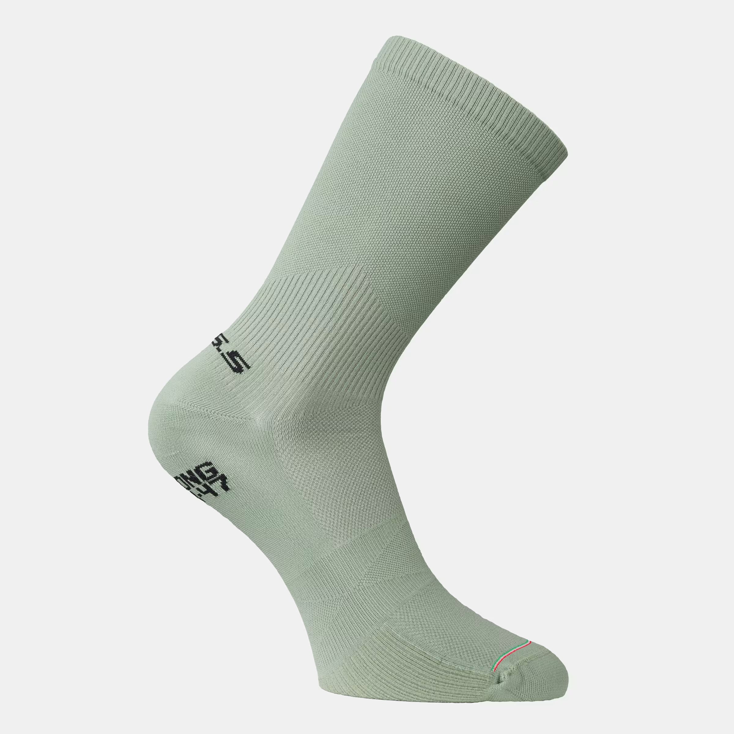Single sage green Q36.5 Ultra Long Socks featuring ribbed calf and breathable knit design against white background