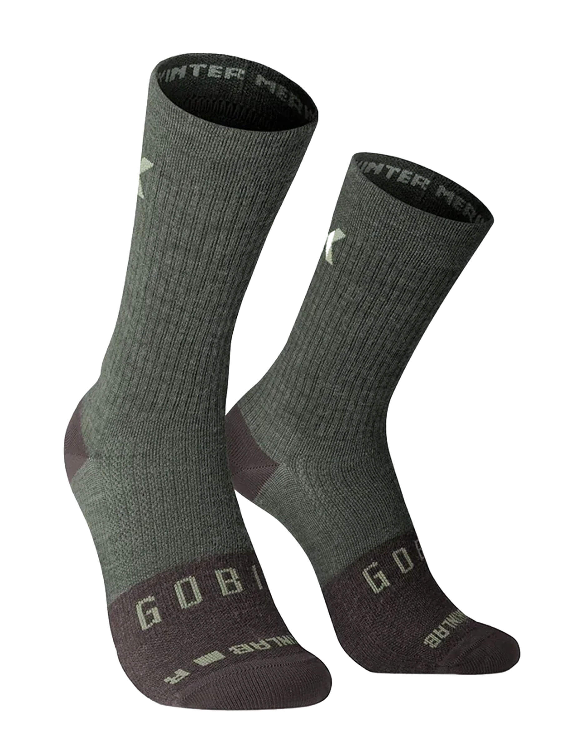 Pair of gray GOBIK Winter Merino Socks designed to keep feet warm and comfortable in cold temperatures