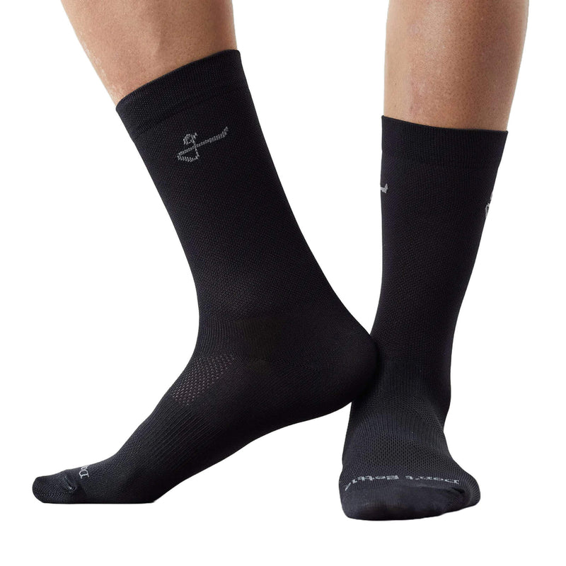 Front view of black Givelo G-Socks with an anchor logo.