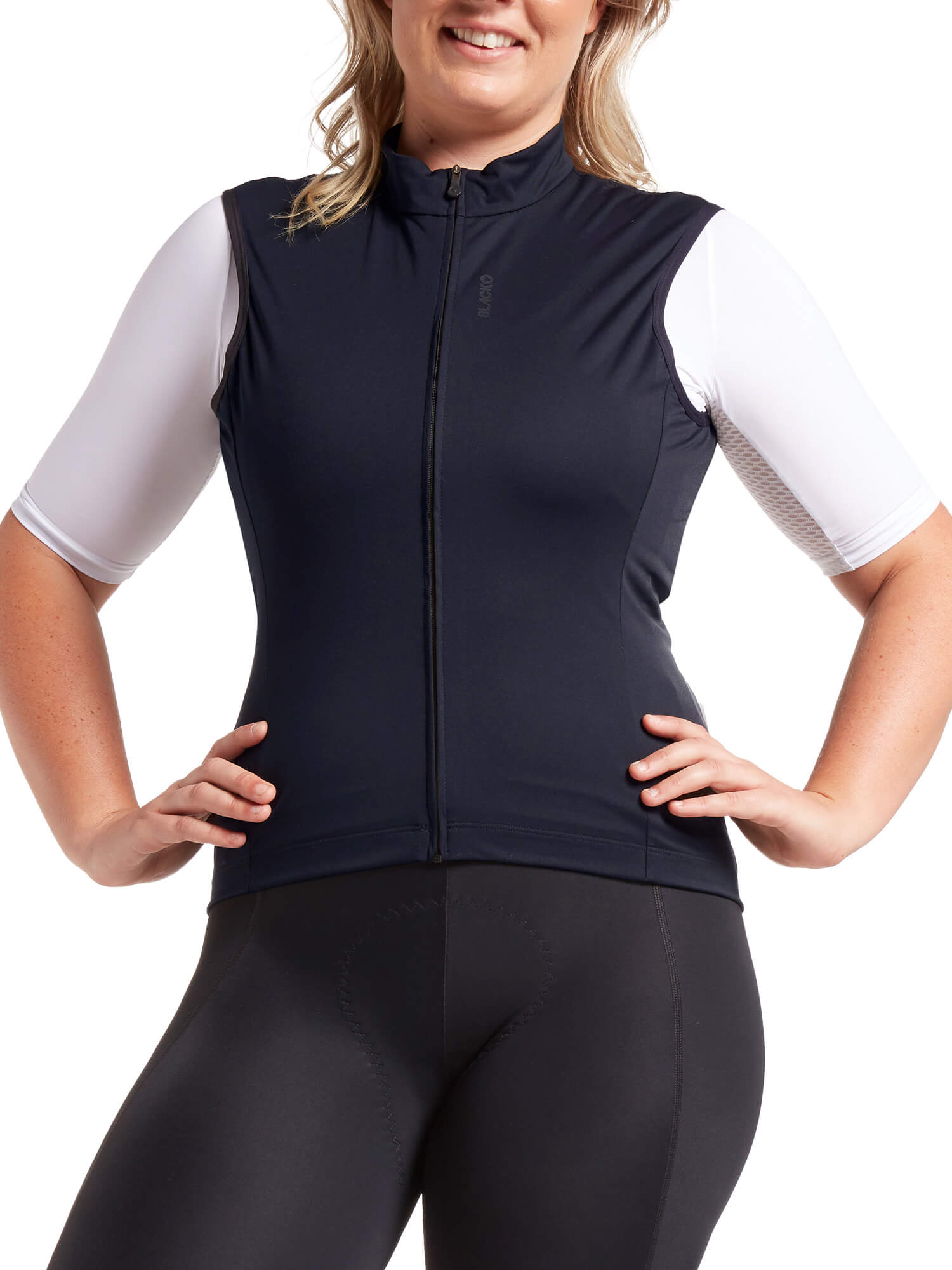 Black Sheep Cycling Essentials TEAM Vest SS22-Women's worn by woman with hands on hips in cycling gear