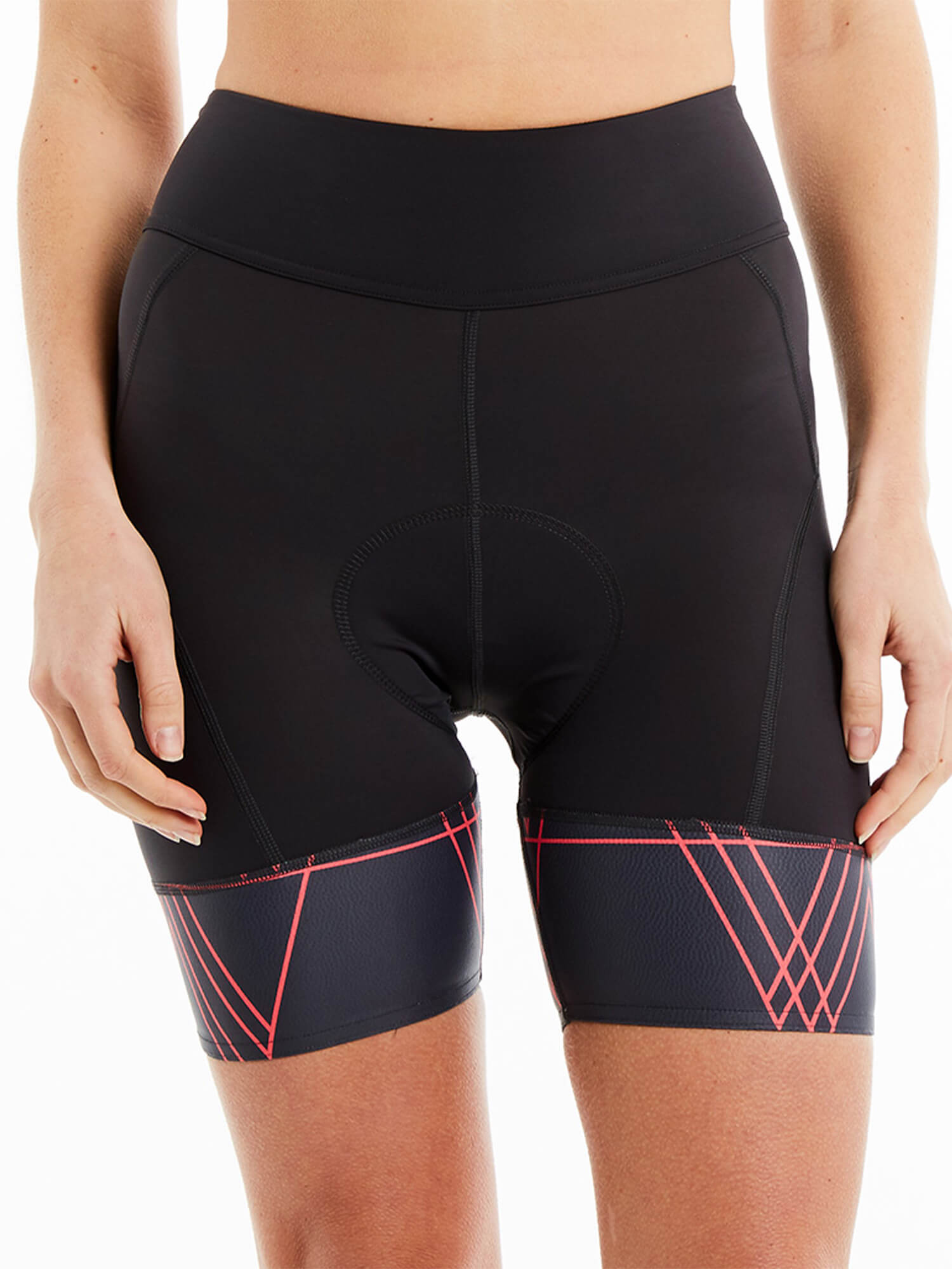Front view of Threo Regent's Park Cycling Shorts showing black fabric with pink geometric pattern on leg bands