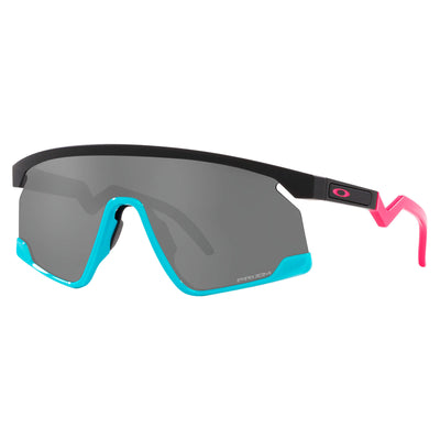 Oakley BXTR Prizm sunglasses with a black frame, pink earstems, and grey lenses.