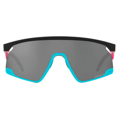 Oakley BXTR Prizm sunglasses with a black frame, pink earstems, and grey lenses.