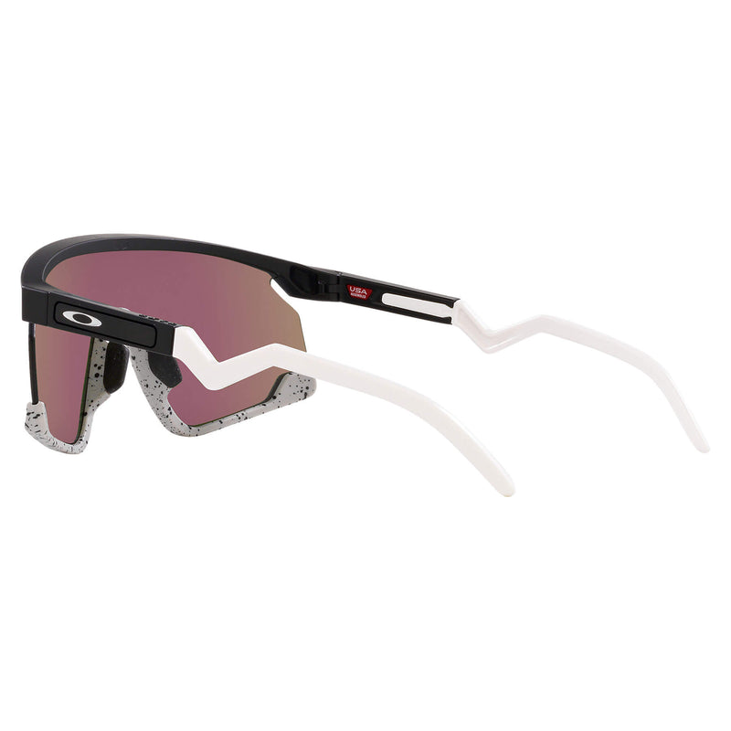 Oakley BXTR Prizm sunglasses with a black frame, white earstems, and blue-to-purple gradient lenses.