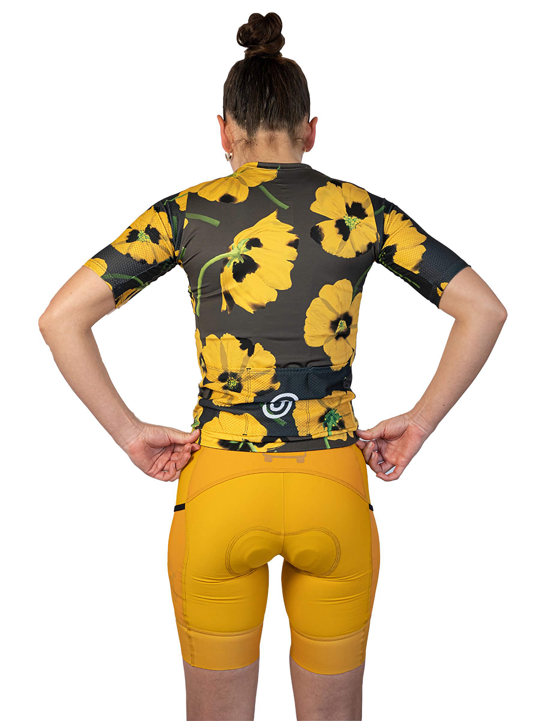 Back view of woman wearing Ostroy Yellow Poppies Jersey - Women's with yellow poppy floral print and 3D mesh sleeves