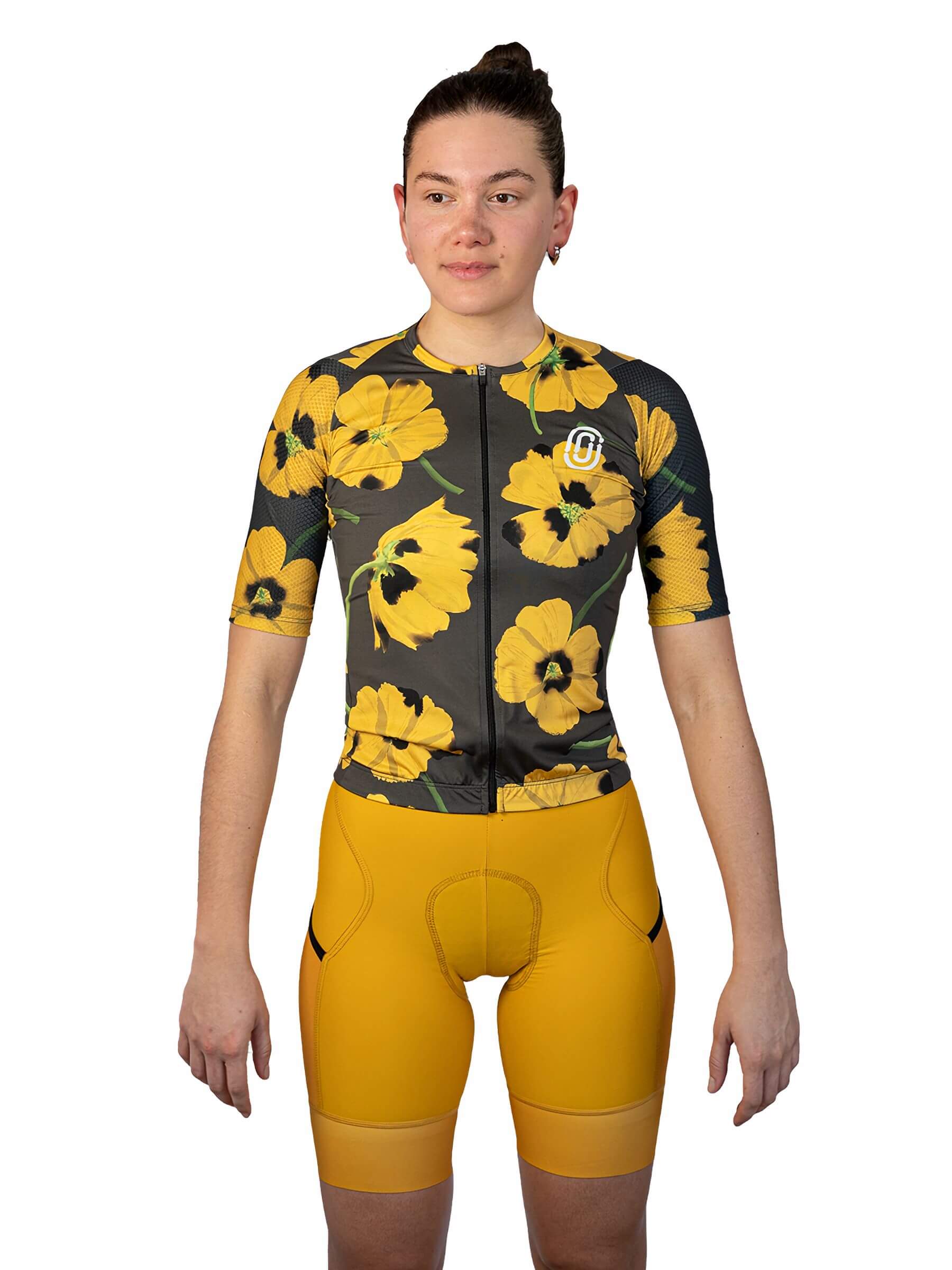 Woman wearing Ostroy Yellow Poppies Jersey - Women's with yellow floral design and fitted short sleeves on white background