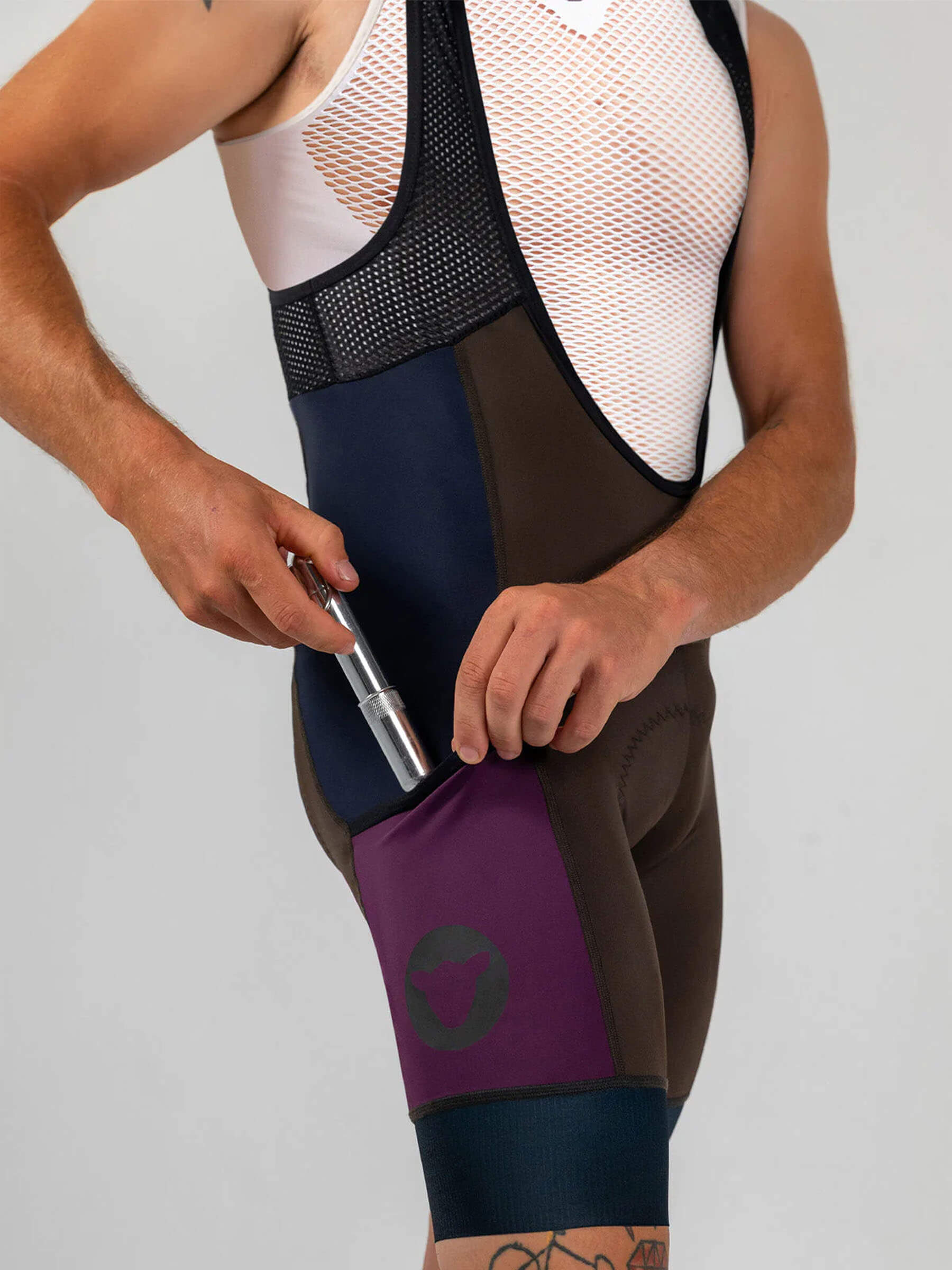 Black Sheep Cycling ADV Cargo Bib Shorts - Men's shown with side cargo pocket and breathable mesh upper panel.