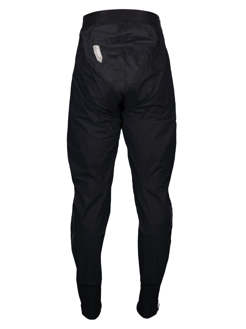 Back view of Q36.5 Rain Overpants highlighting sealed zippers and reflective ankles.