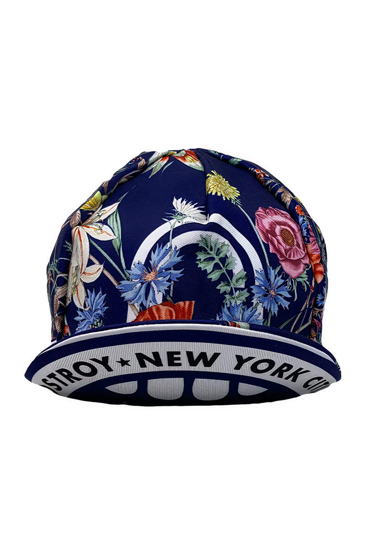 Floral cycling cap with "Ostroy+ NEW YORK" on the brim.