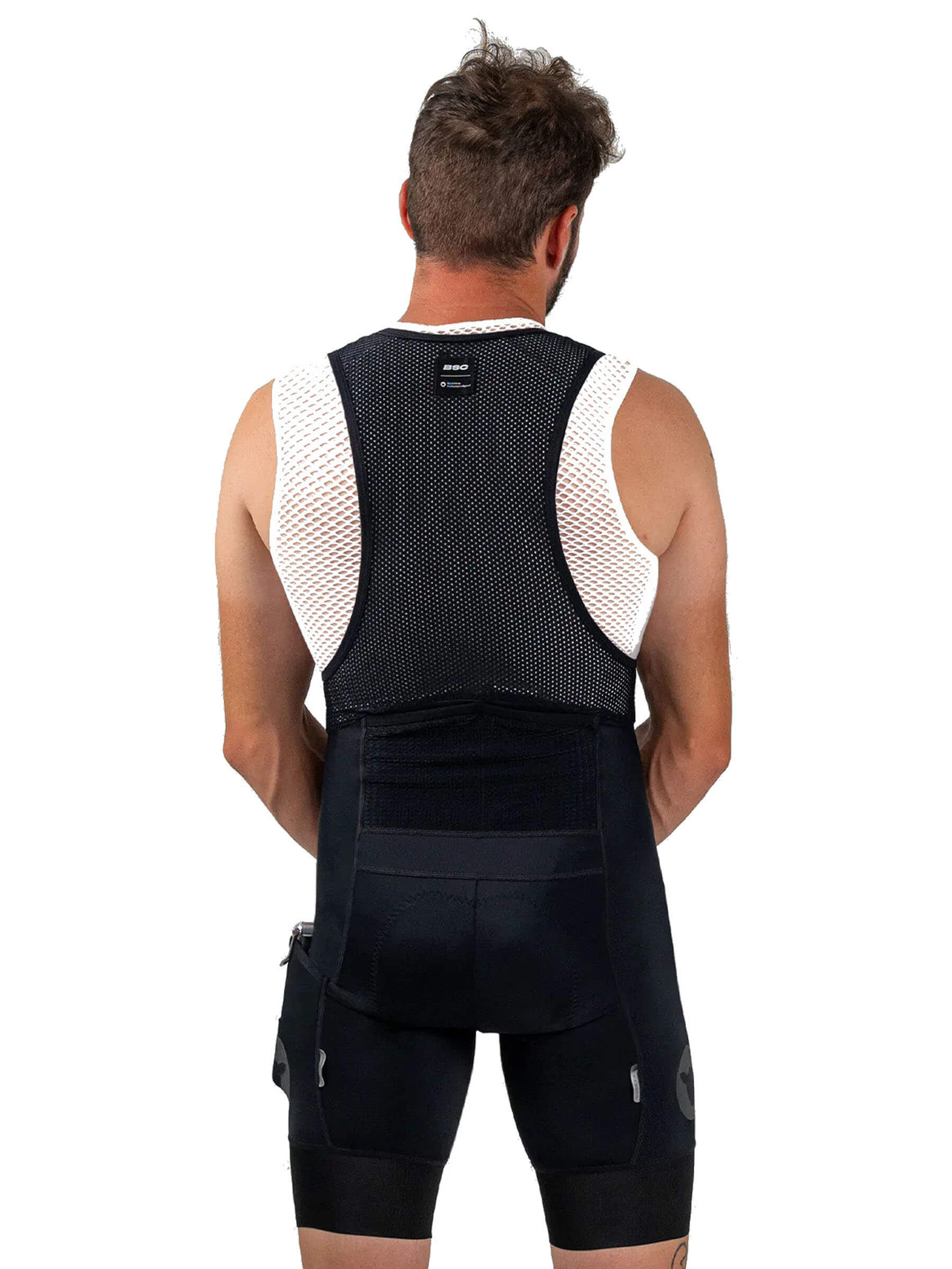 Back view of a man wearing Black Sheep Cycling ADV Cargo Bib Shorts - Men's with mesh upper and cargo pockets