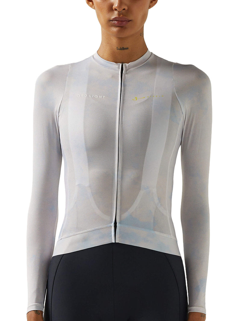 Female cyclist in a textured Givelo G90 Light long-sleeve jersey, blending comfort with style.
