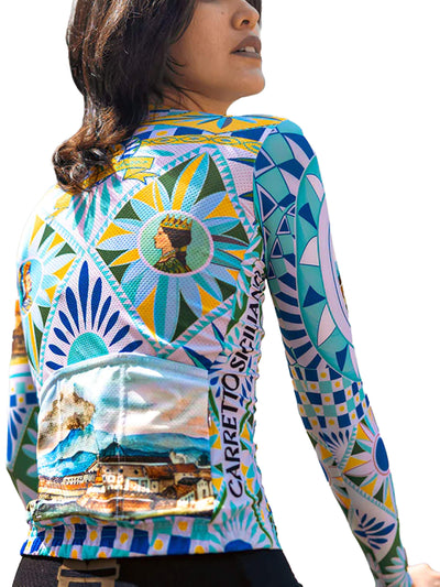 Side view of Ostroy Carretto jersey on a model, highlighting the long sleeves and colorful, detailed artwork that pays homage to traditional Sicilian carts.