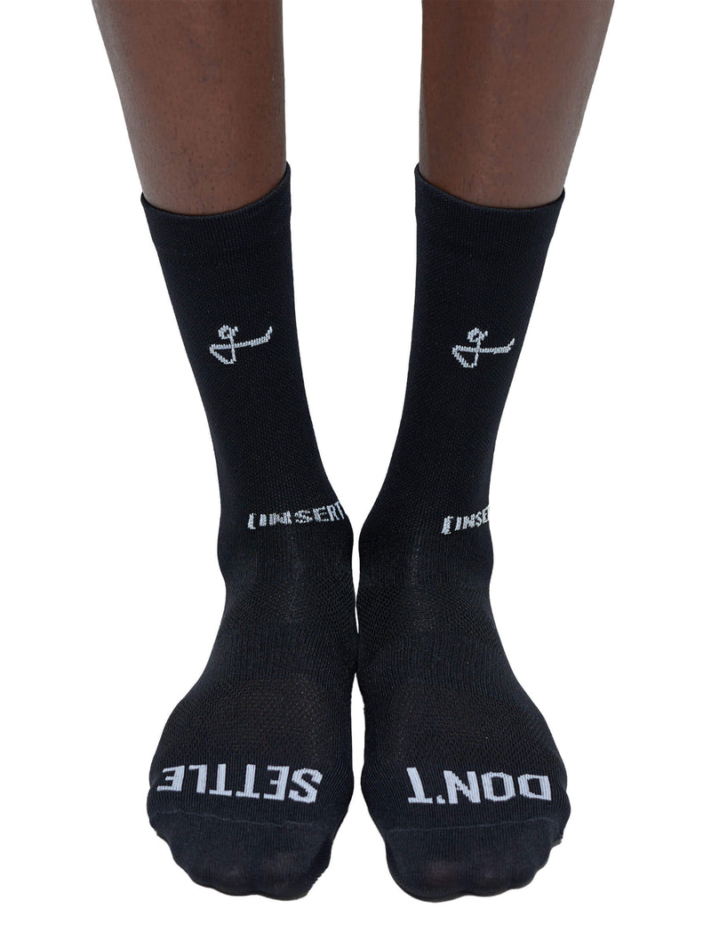 Front view of a pair of black Givelo G-Socks with the brand&