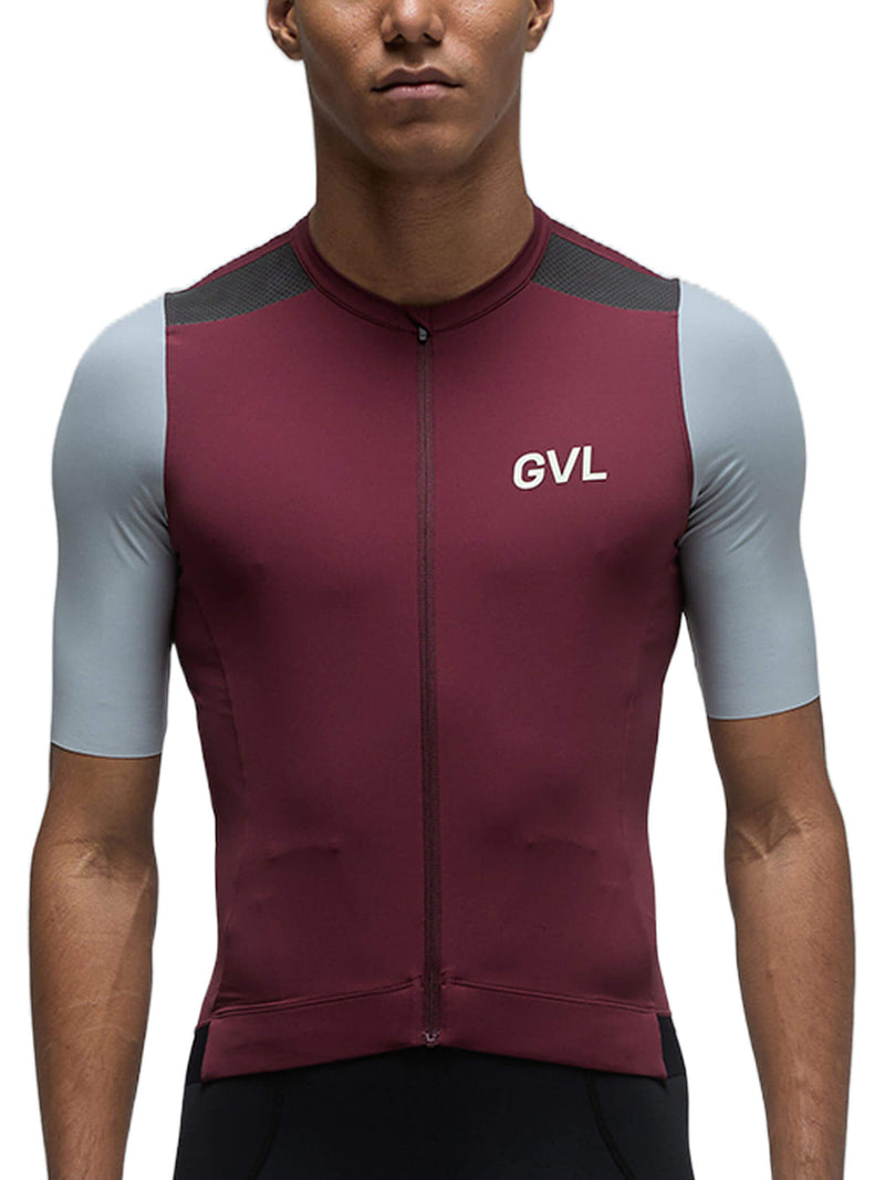 Full front view of a person wearing the Givelo Modern Classic Jersey in maroon with contrasting grey shoulder panels. The jersey features a mid-weight fabric that offers UPF50+ UV protection and excellent moisture-wicking properties.