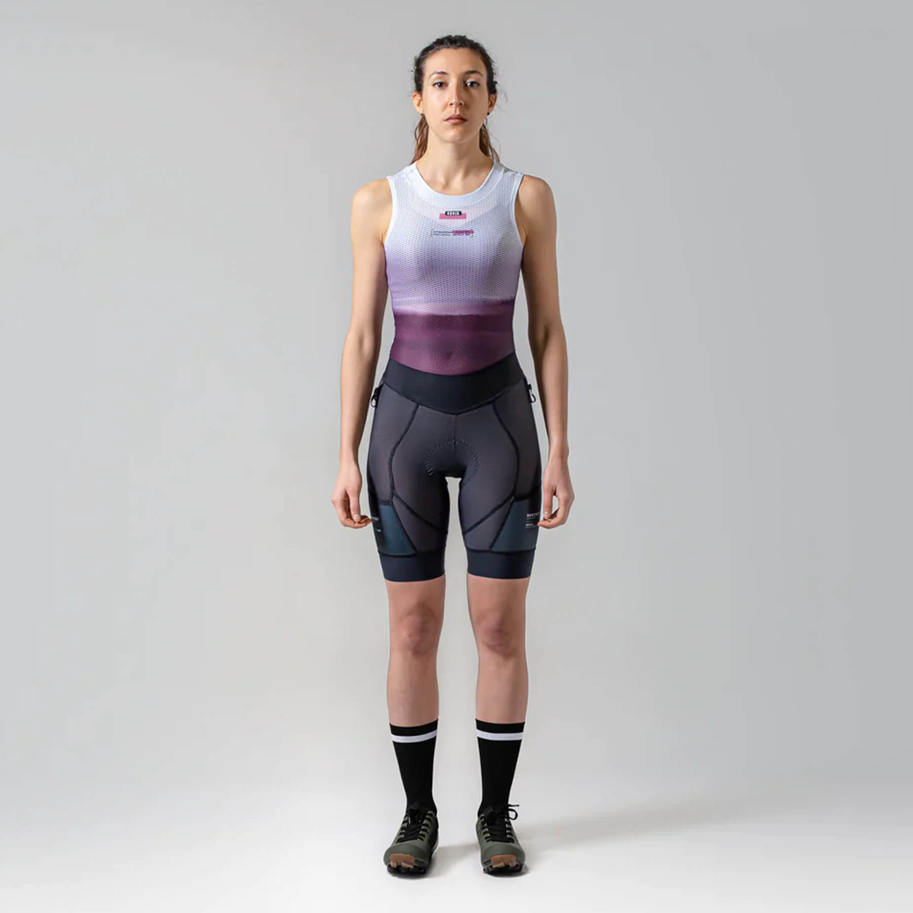 Woman wearing GOBIK Commander Strapless K6 Bib Shorts - Women’s standing against plain background