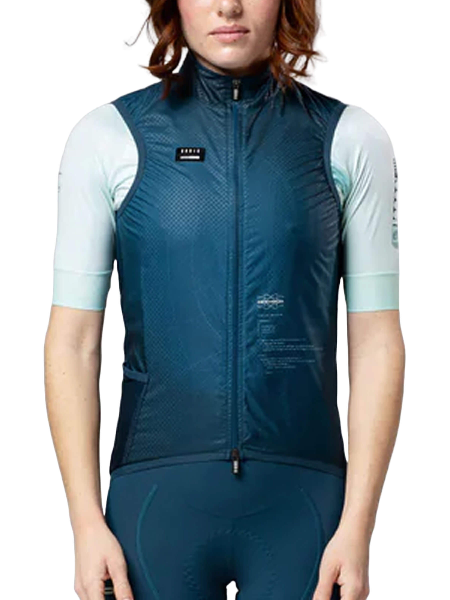 Woman wearing a blue GOBIK Vest Plus 2.0 - Women's with a full front zipper and aerodynamic fit