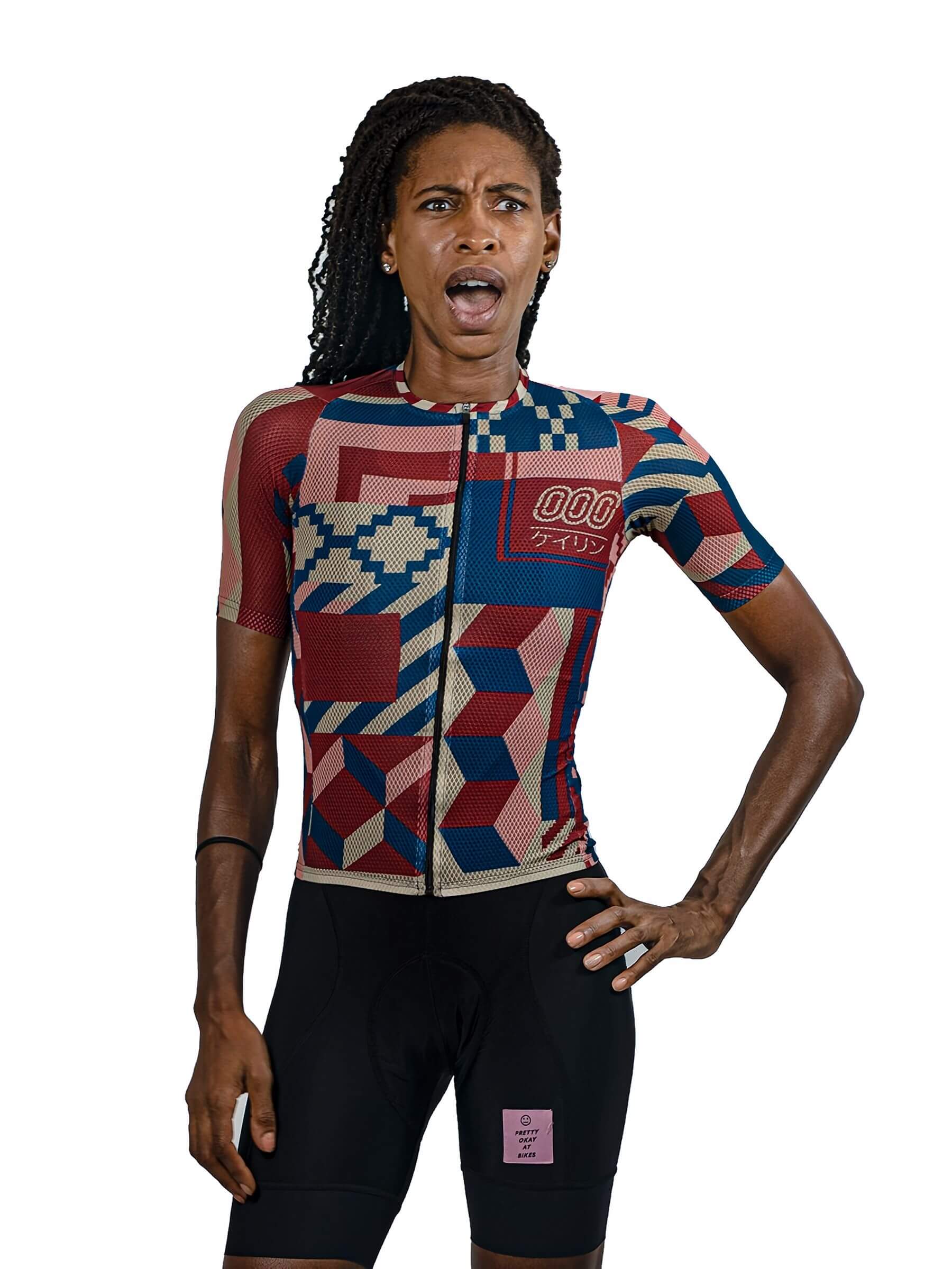Woman wearing Ostroy Keirin Mesh Jersey - Women's with geometric pattern and front zipper against white background