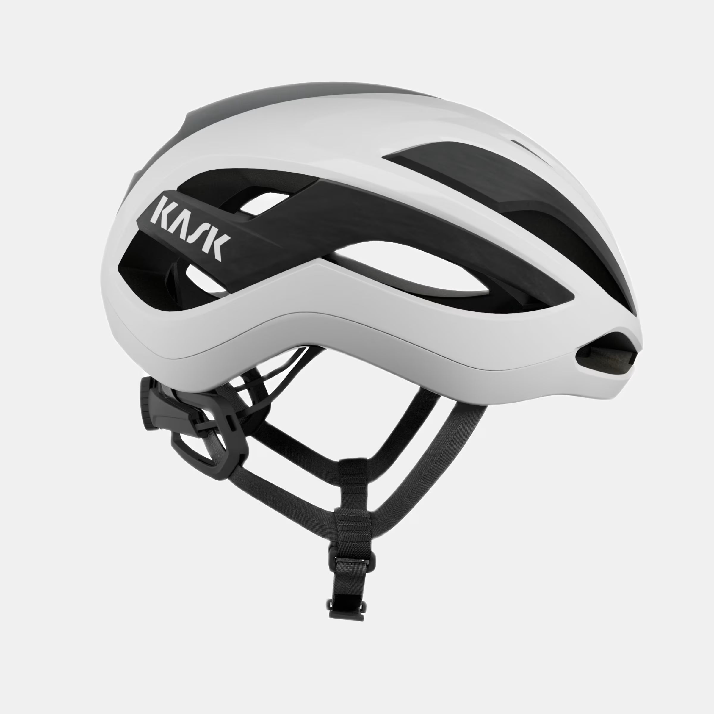 Kask Elemento Helmet  - White side view showing aero design, ventilation channels, and adjustable straps for cycling safety and comfort