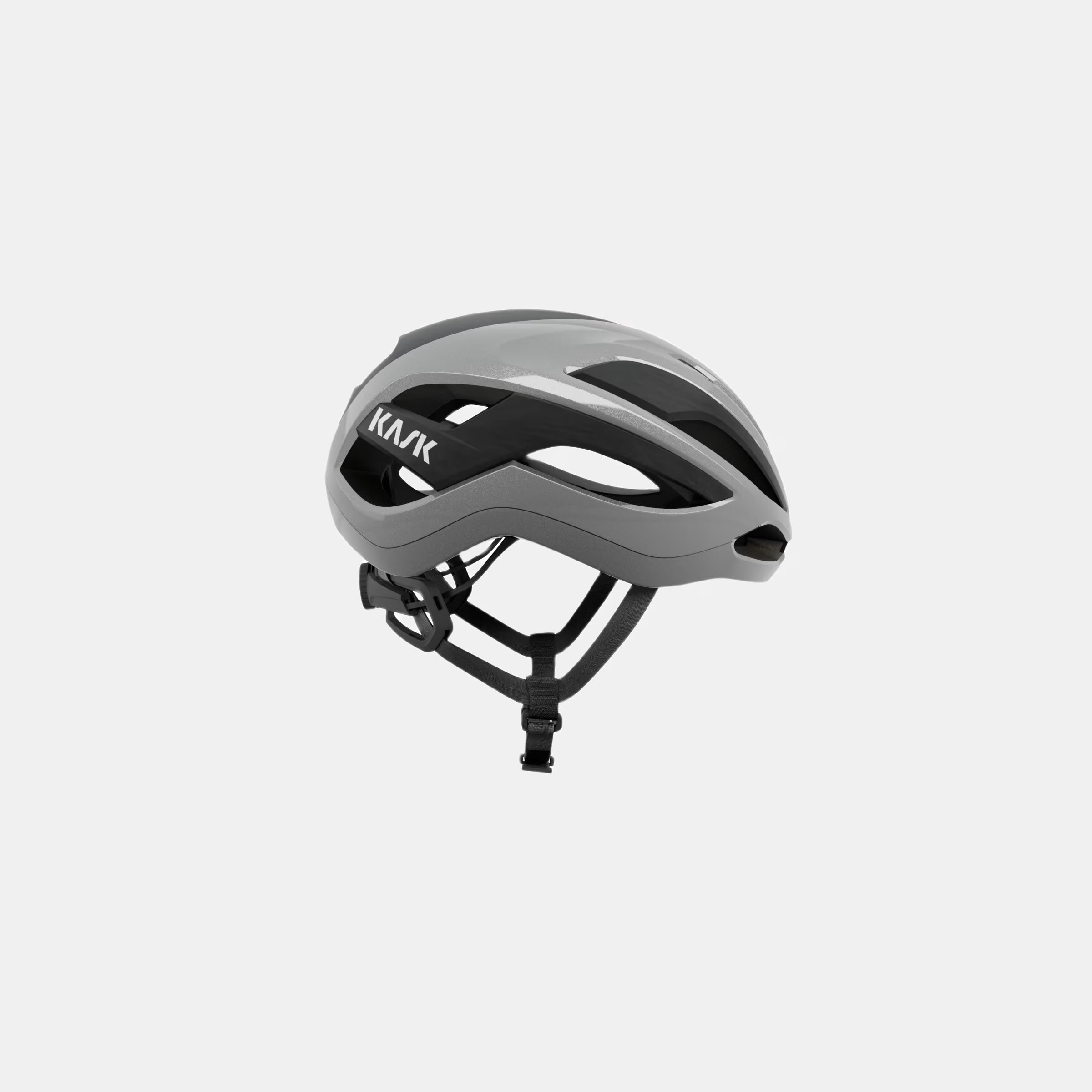 Kask Elemento Helmet  - Silver side view showing aerodynamic design and adjustable straps for cycling safety and comfort