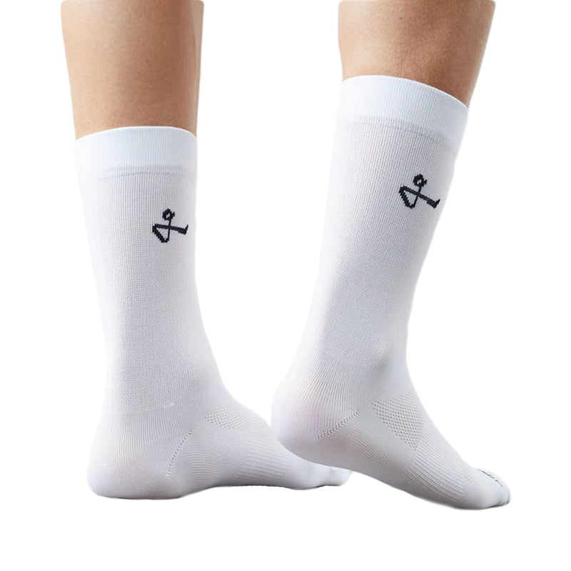 Side view of white Givelo G-Socks with an anchor logo.