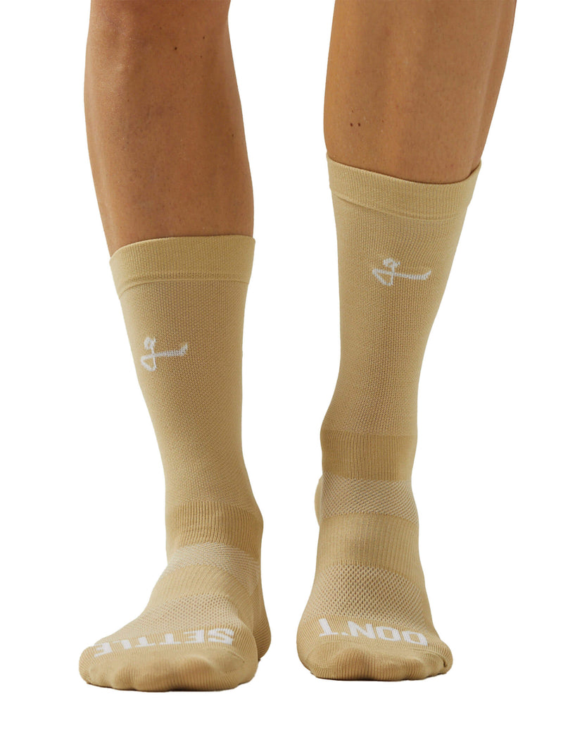 Image of mint green Givelo G-Socks, side view, showcasing the lightweight fabric and ventilation zones. The Givelo logo is present on the cuff and the footbed, suggesting a design for active use.