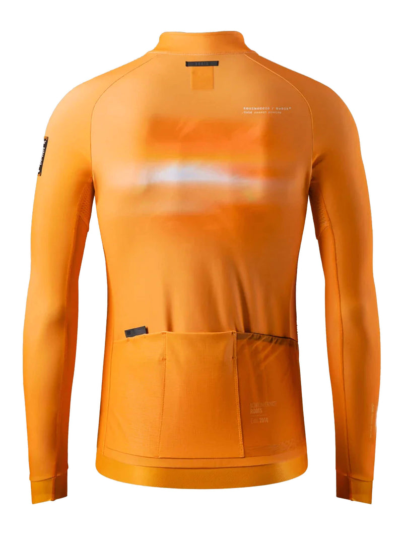 Vibrant cheddar orange GOBIK Hyder jersey featuring laser-cut cuffs and plush interior for cold weather.