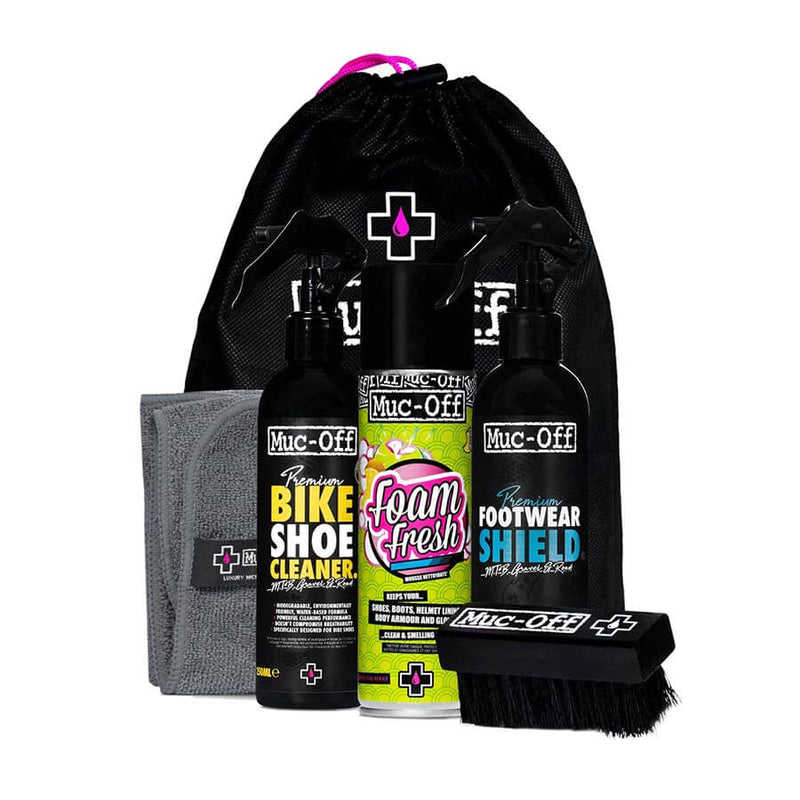 Muc-Off Bike Shoe Care Kit with cleaner, foam, brush, cloth in a drawstring bag.