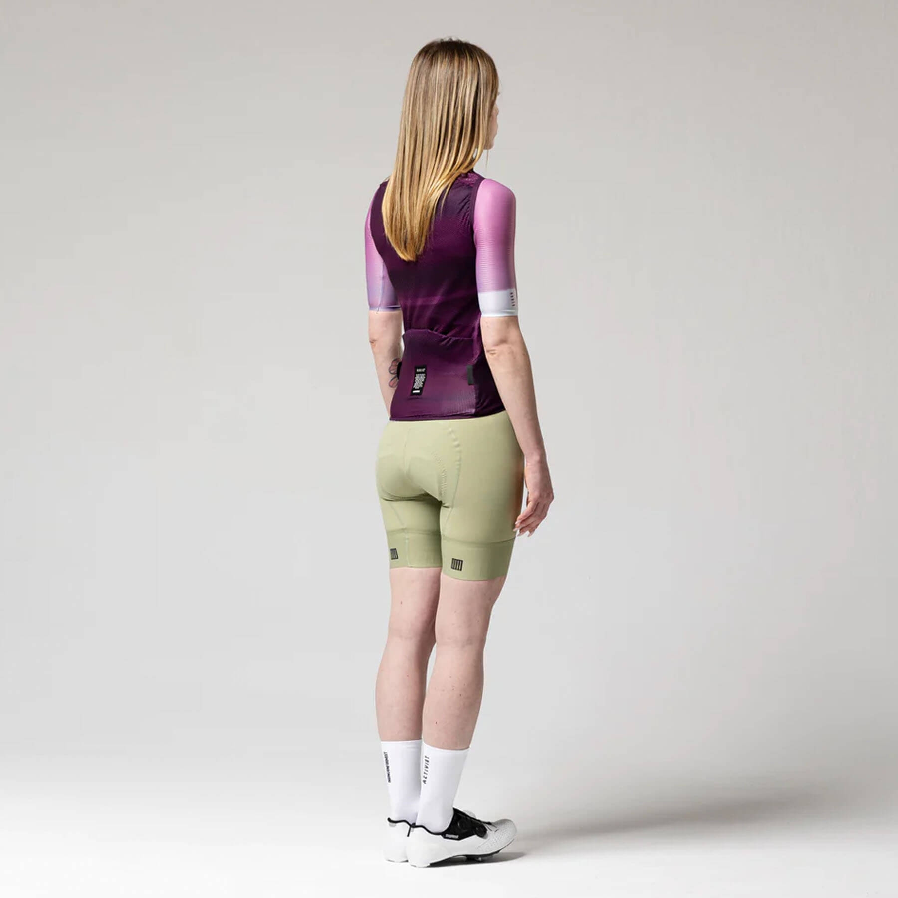 Woman wearing GOBIK Vest Plus 2.0 - Women's showing the anatomically optimized fit and collar from the back