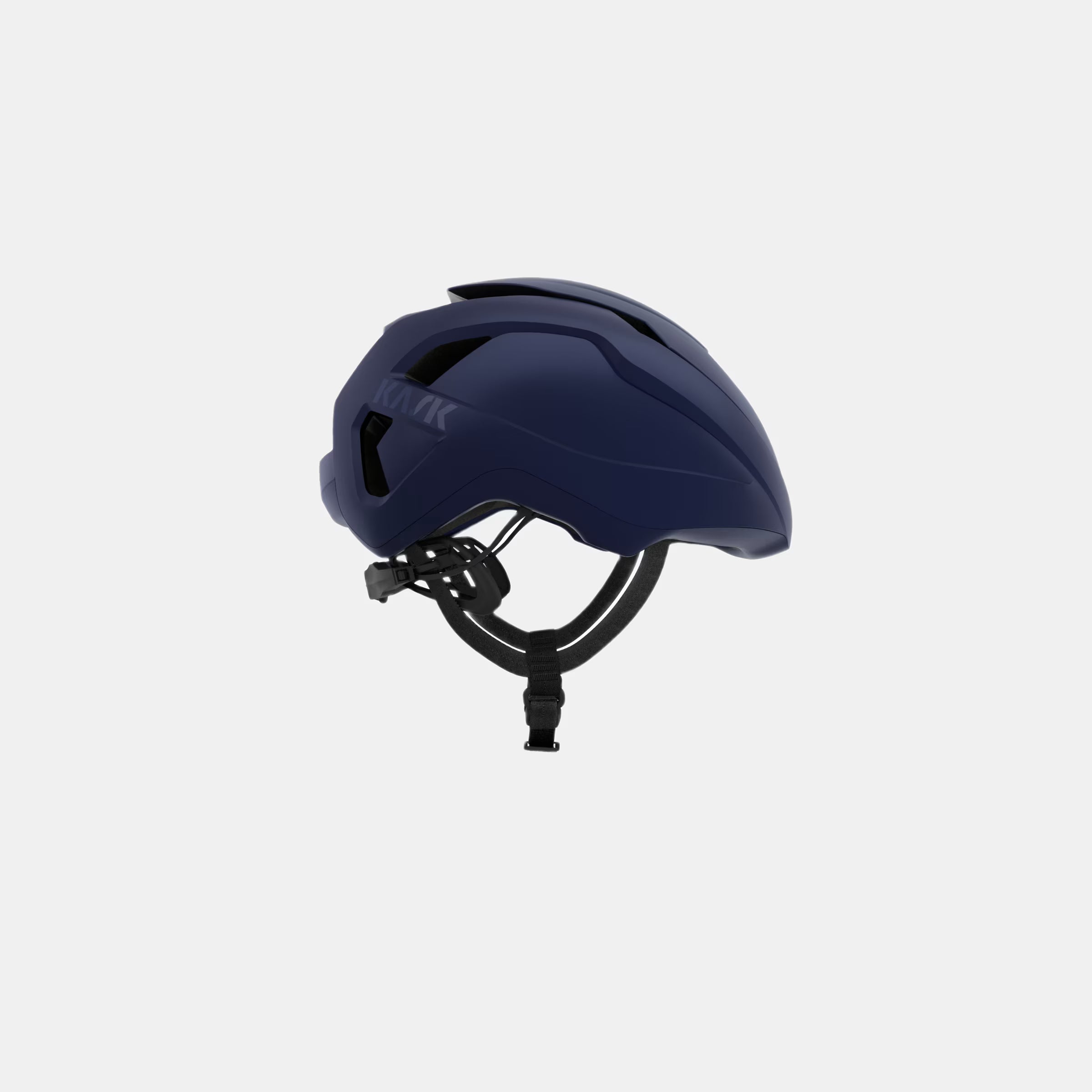 Kask Wasabi Helmet - Blue Matt side view showing streamlined design and adjustable strap for comfortable fit