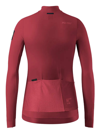 Back view of an amaranth red Hyder cycling jacket with two pockets and a side mesh pocket for carrying essentials.