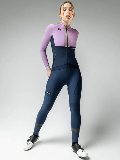 Female cyclist in HYDER BLEND ORCHID long sleeve jersey with aerodynamic fit and 2 GRS rear pockets.