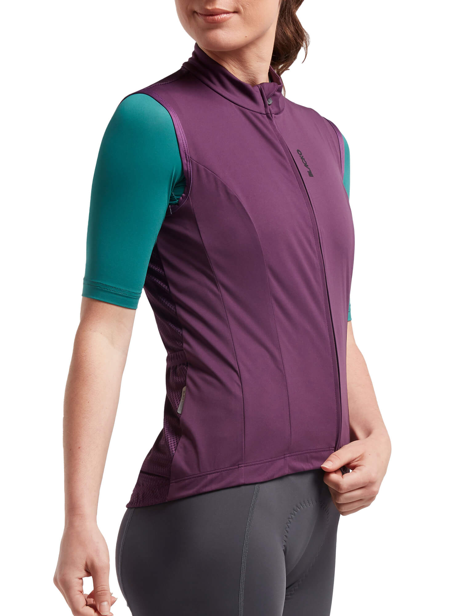 Woman wearing Black Sheep Cycling Essentials TEAM Vest SS22-Women's in purple, styled for cycling comfort and protection