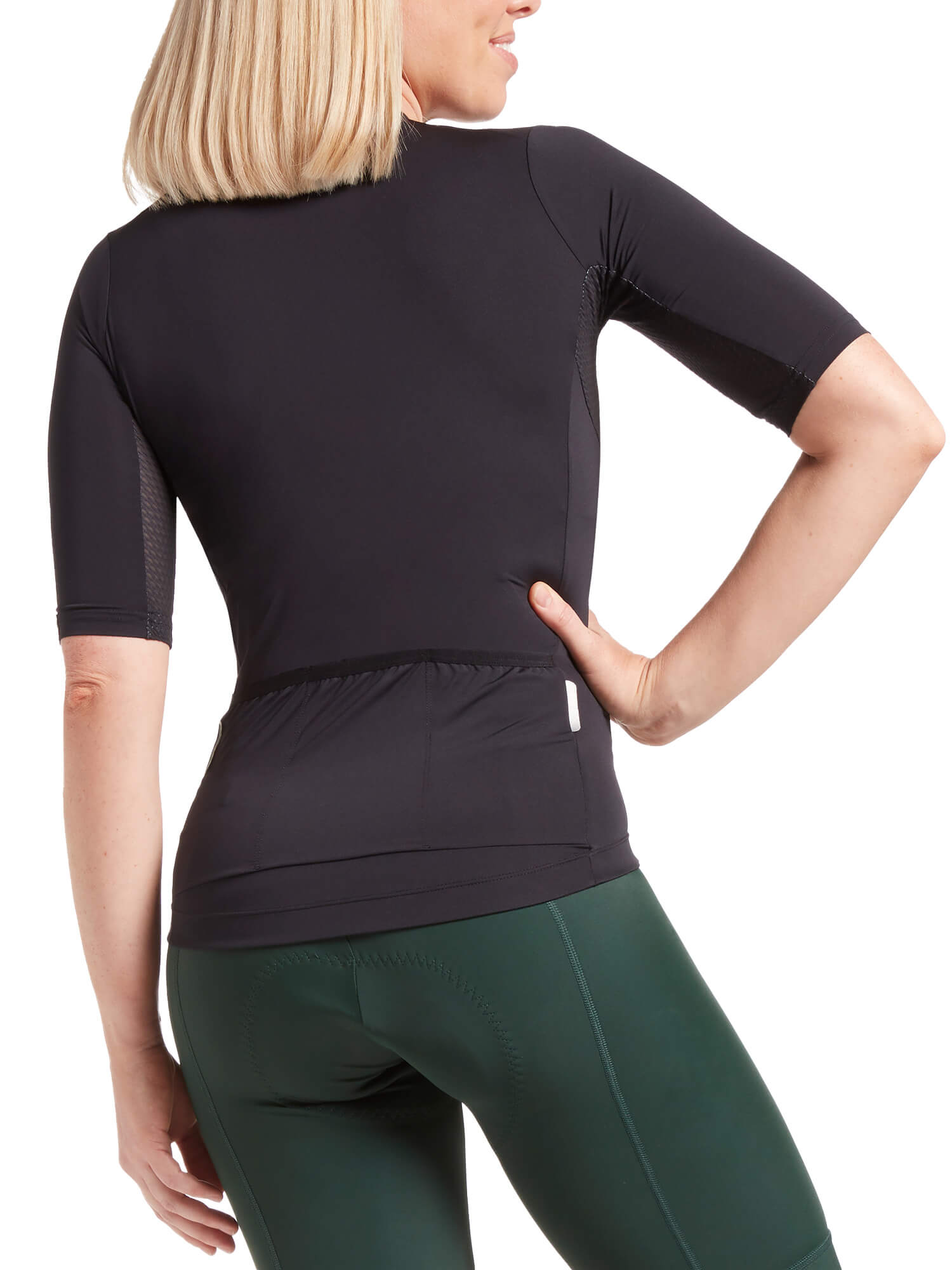 Woman wearing Black Sheep Cycling Essentials TEAM Jersey SS22- Women's showing back pockets and fitted short sleeves