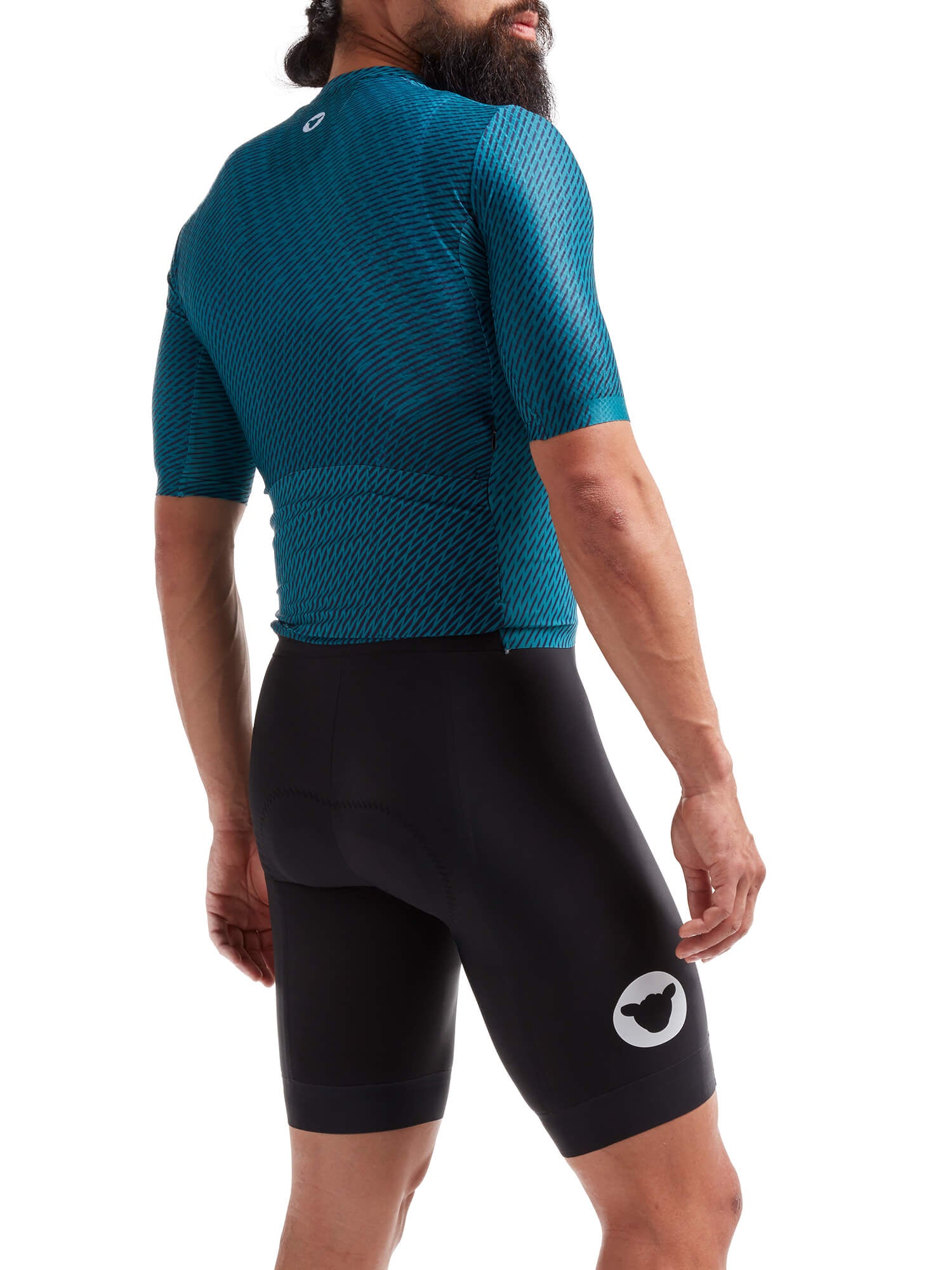 Man wearing Black Sheep Cycling Racing Aero Jersey - Men's with blue textured sleeves and black cycling shorts viewed from back