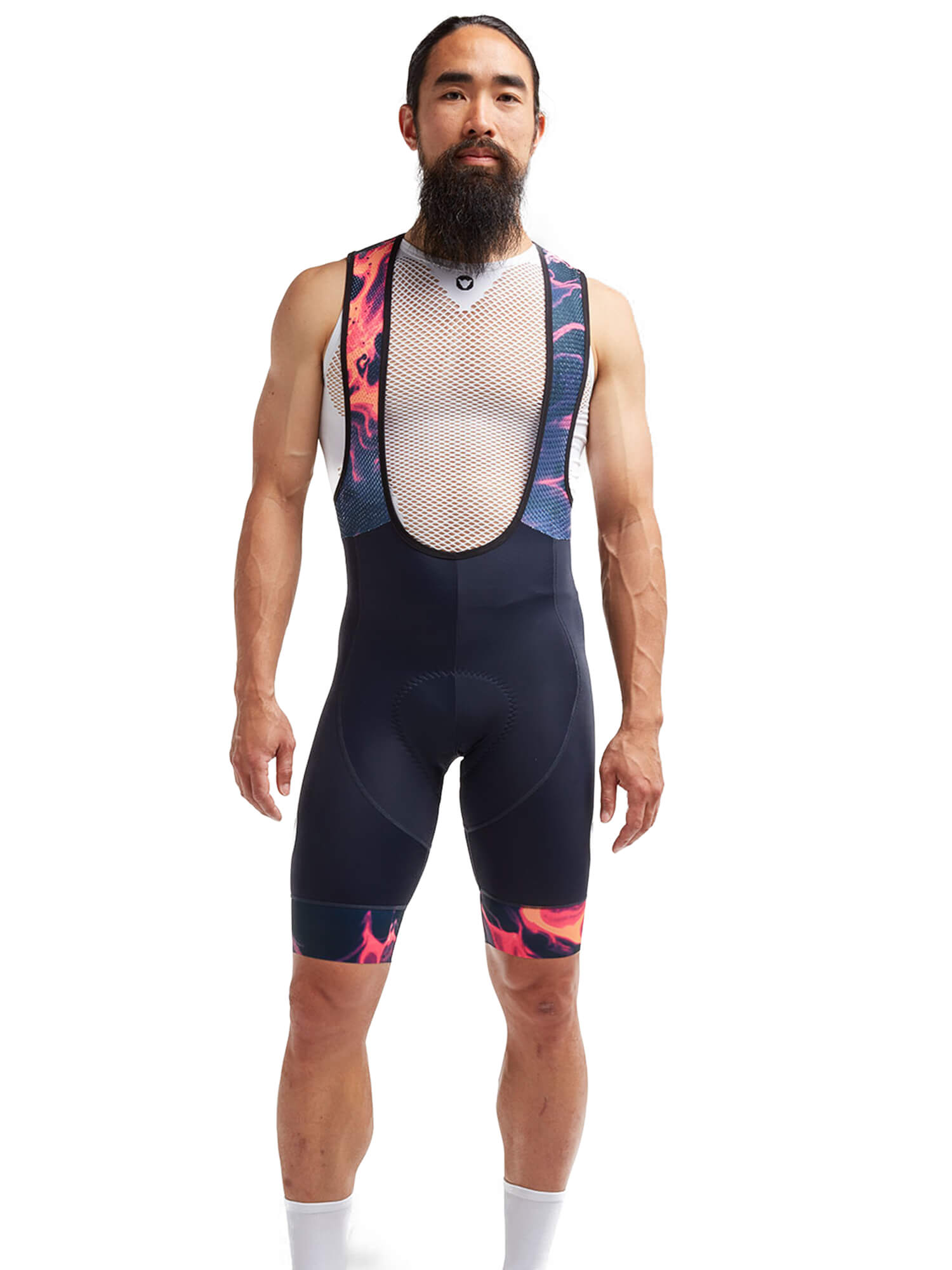 Man wearing Black Sheep Cycling Men's Essentials TOUR Bib - LTD Neon Supernova with neon cyber punk design and deep cuffs