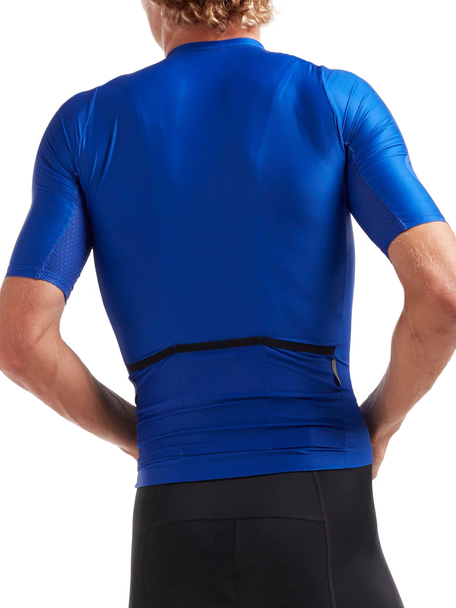 Back view of a man wearing Black Sheep Cycling Essentials TEAM Jersey - Men's in solid blue with black cycling shorts