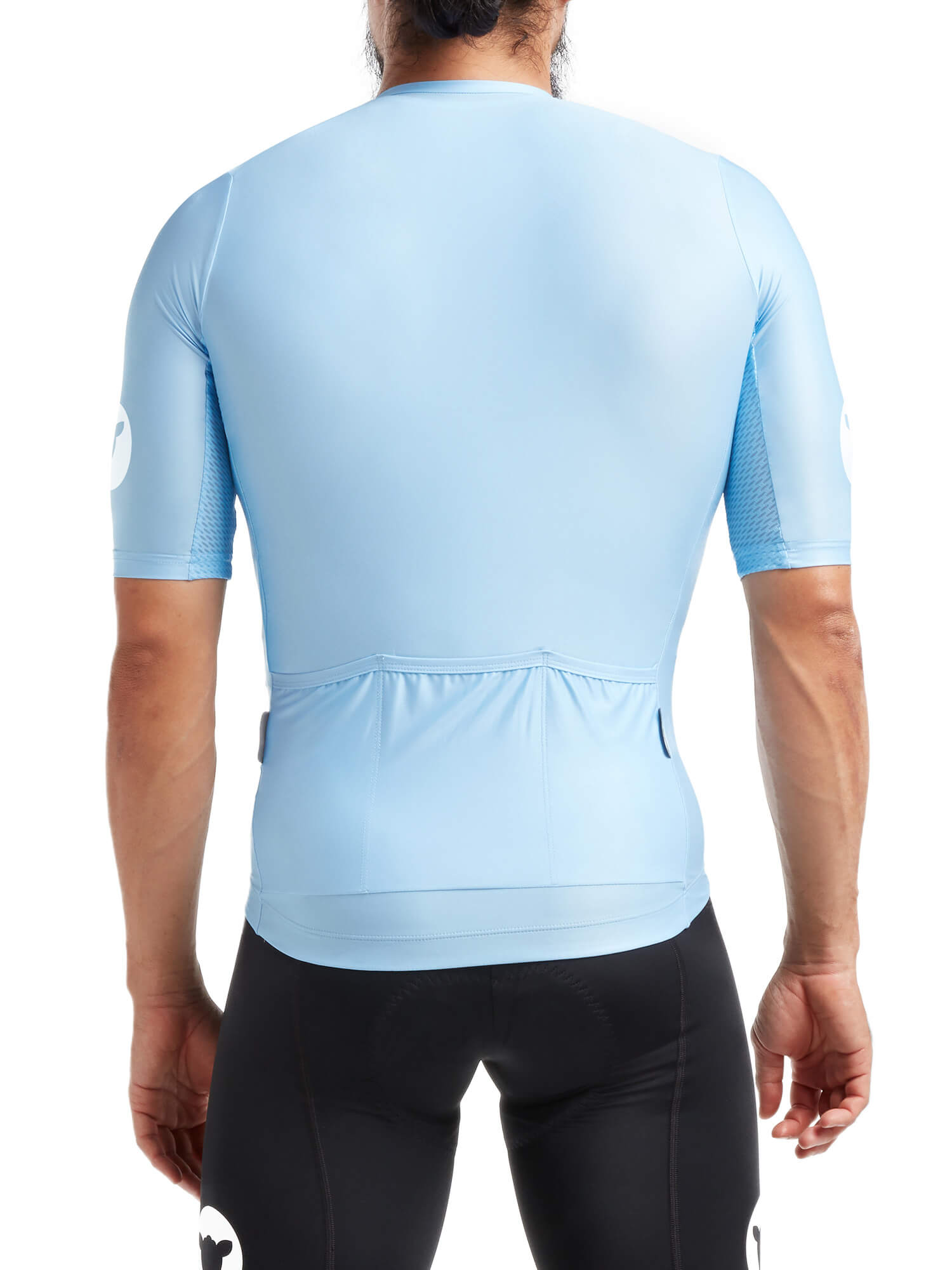 Rear view of a male model wearing a light blue Black Sheep Cycling Essentials TEAM Jersey - Men's showing fabric and fit details