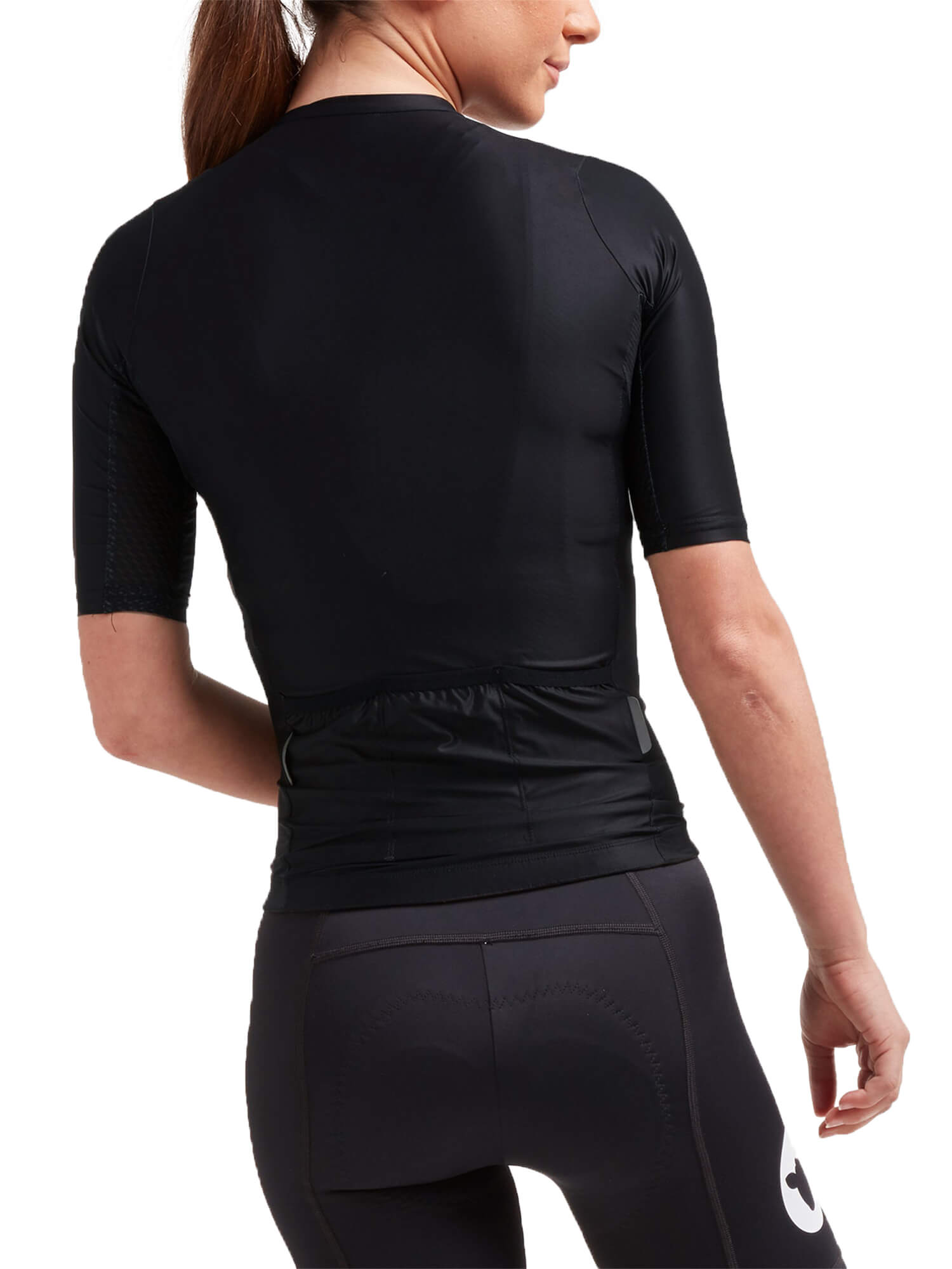 Woman wearing Black Sheep Cycling Essentials TEAM Jersey - Women's in solid black, shown from the back with short sleeves