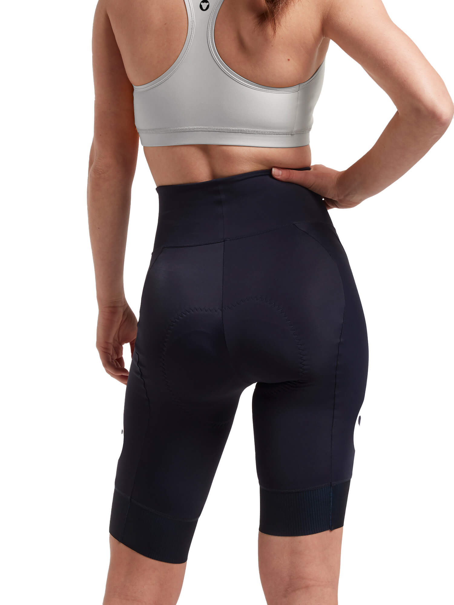 Woman wearing Black Sheep Cycling Essentials TEAM Shorts - Women shown from back in fitted black cycling shorts