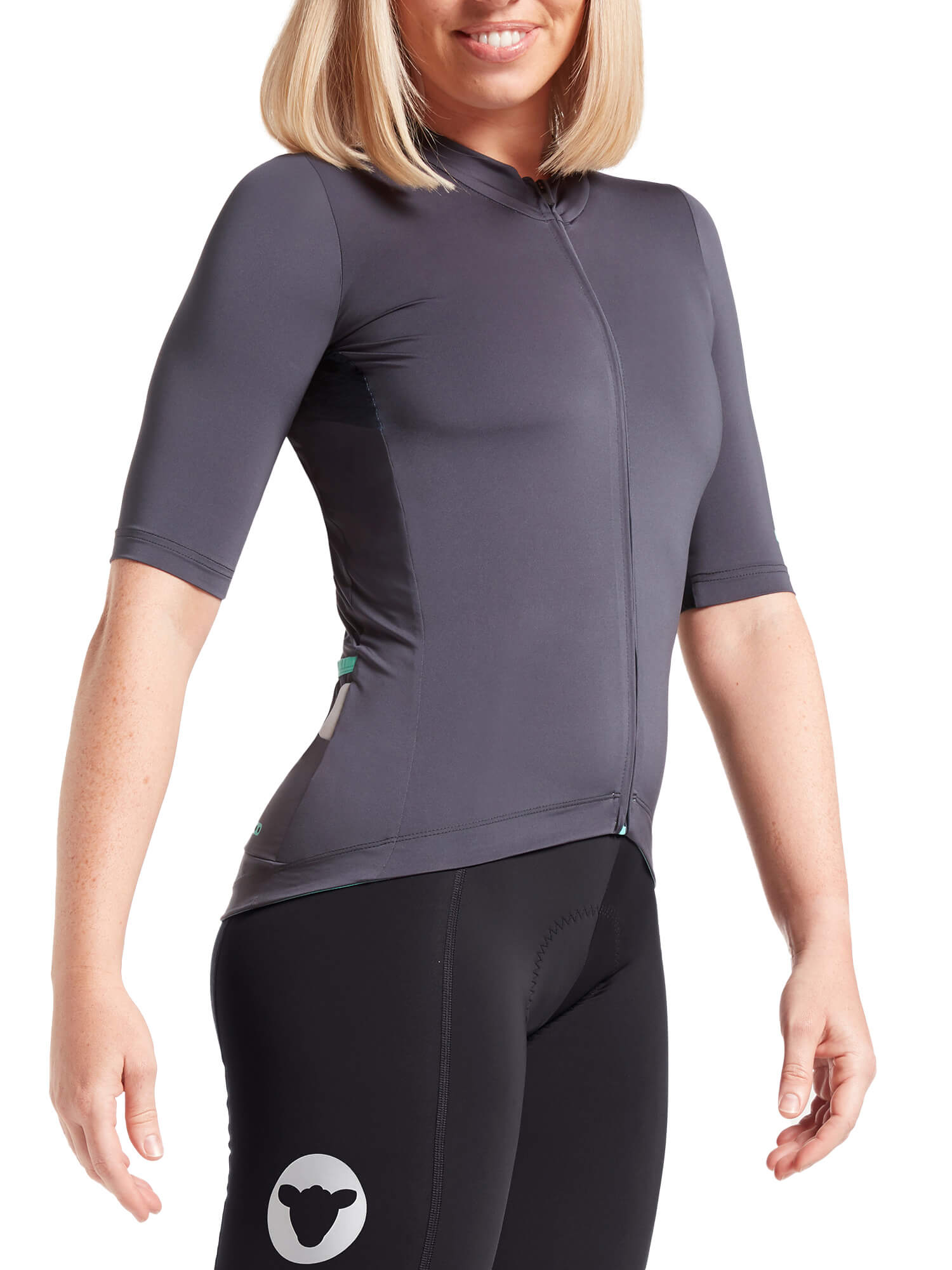 Woman wearing Black Sheep Cycling Essentials TEAM Jersey SS22- Women's with race fit and half sleeves in dark grey color